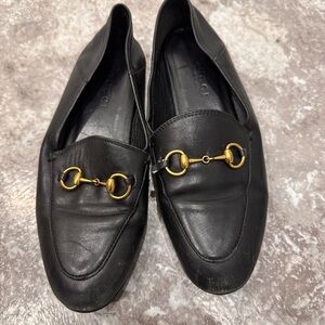 Gucci Black Leather Loafers with Gold Accents